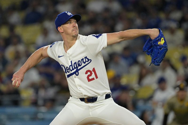 Sep 26, 2024; Los Angeles, California, USA;  Los Angeles Dodgers starting pitcher Walker Buehler (21) delivers to the plate in the first inning against the San Diego Padres at Dodger Stadium. Mandatory Credit: Jayne Kamin-Oncea-Imagn Images