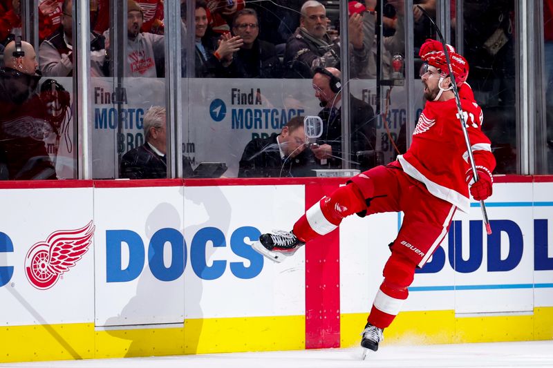 Jan 31, 2024; Detroit, Michigan, USA;  Detroit Red Wings center Dylan Larkin (71) celebrates after scoring in the third period against the Ottawa Senators at Little Caesars Arena. Mandatory Credit: Rick Osentoski-USA TODAY Sports