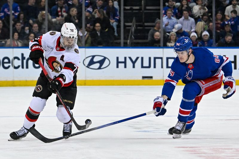 Jan 21, 2025; New York, New York, USA;  Ottawa Senators defenseman Thomas Chabot (72) skates with the [uck defended by New York Rangers center Adam Edstrom (84) during the first period at Madison Square Garden. Mandatory Credit: Dennis Schneidler-Imagn Images