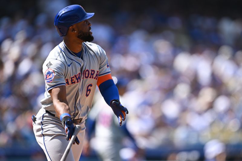 Apr 20, 2024; Los Angeles, California, USA; New York Mets outfielder Starling Marte (6) hits a home run against the Los Angeles Dodgers during the sixth inning at Dodger Stadium. Mandatory Credit: Jonathan Hui-USA TODAY Sports