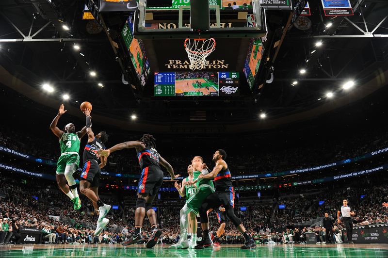 BOSTON, MA - DECEMBER 12: Jrue Holiday #4 of the Boston Celtics shoots the ball during the game against the Detroit Pistons on December 12, 2024 at TD Garden in Boston, Massachusetts. NOTE TO USER: User expressly acknowledges and agrees that, by downloading and/or using this Photograph, user is consenting to the terms and conditions of the Getty Images License Agreement. Mandatory Copyright Notice: Copyright 2024 NBAE (Photo by Brian Babineau/NBAE via Getty Images)