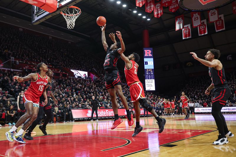 Feb 25, 2024; Piscataway, New Jersey, USA; Rutgers Scarlet Knights guard Jeremiah Williams (25) rebounds against Maryland Terrapins forward Jordan Geronimo (22) during the first half at Jersey Mike's Arena. Mandatory Credit: Vincent Carchietta-USA TODAY Sports