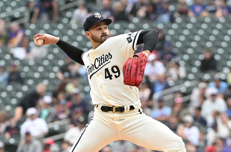 Sep 10, 2023; Minneapolis, Minnesota, USA; Minnesota Twins starting pitcher Pablo Lopez (49) delivers a pitch against the New York Mets in the second inning at Target Field. Mandatory Credit: Michael McLoone-USA TODAY Sports