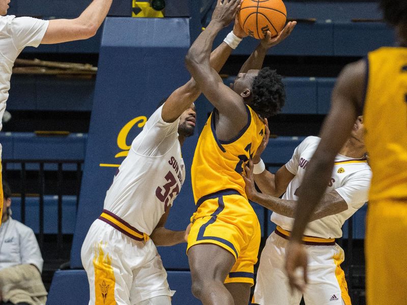 Feb 11, 2023; Berkeley, California, USA; California Golden Bears forward Sam Alajiki (24) is fouled by Arizona State Sun Devils guard Malcolm Flaggs (33) during the first half at Haas Pavilion. Mandatory Credit: Neville E. Guard-USA TODAY Sports