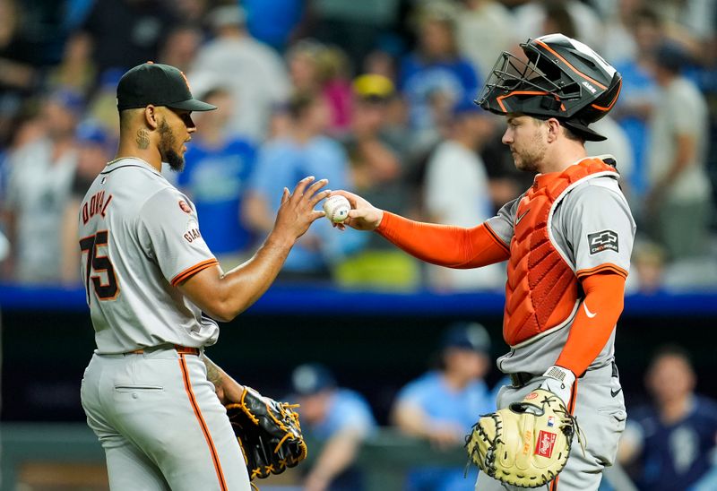 Sep 20, 2024; Kansas City, Missouri, USA; San Francisco Giants relief pitcher Camilo Doval (75) celebrates with catcher Patrick Bailey (14) after defeating the Kansas City Royals at Kauffman Stadium. Mandatory Credit: Jay Biggerstaff-Imagn Images