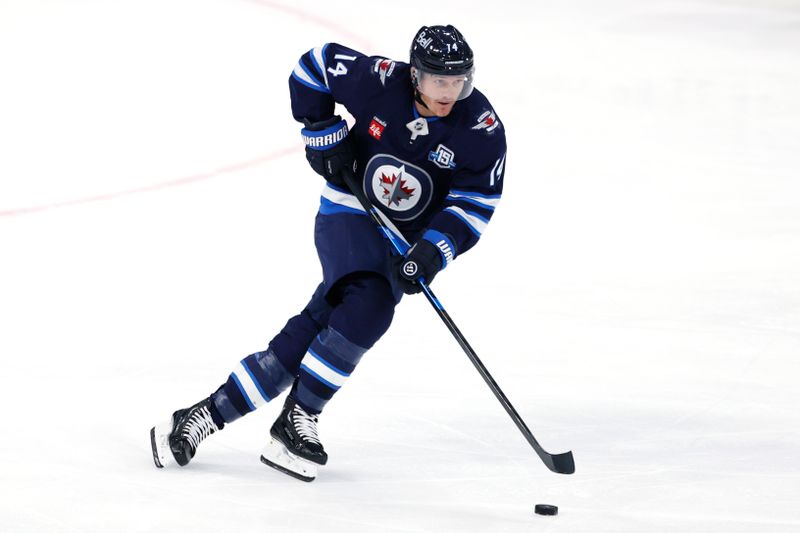 Oct 9, 2025; Winnipeg, Manitoba, CAN; Winnipeg Jets right wing Gustav Nyquist (14) skates up the ice during a game against the Dallas Stars in the second period at Canada Life Centre. Mandatory Credit: James Carey Lauder-Imagn Images