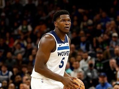 MINNEAPOLIS, MINNESOTA - NOVEMBER 01: Anthony Edwards #5 of the Minnesota Timberwolves dribbles the ball against the Denver Nuggets in the first quarter at Target Center on November 01, 2023 in Minneapolis, Minnesota. The Timberwolves defeated the Nuggets 110-89. NOTE TO USER: User expressly acknowledges and agrees that, by downloading and or using this photograph, User is consenting to the terms and conditions of the Getty Images License Agreement. (Photo by David Berding/Getty Images)