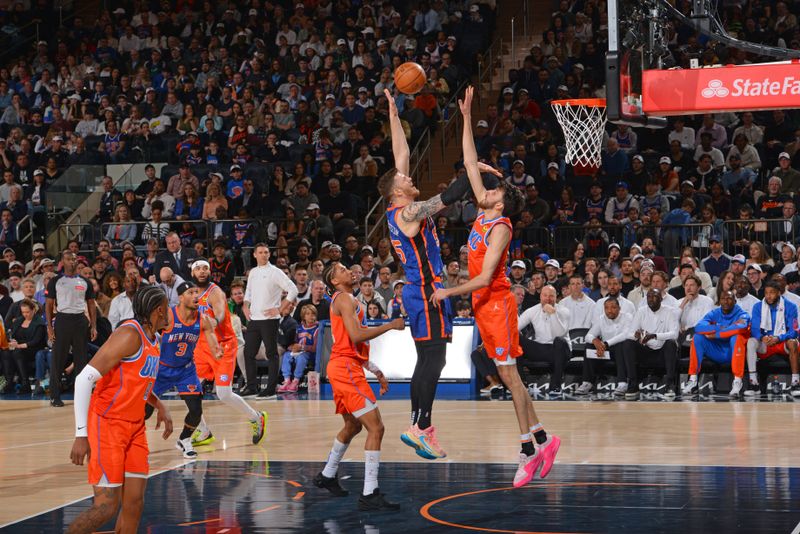 NEW YORK, NY - MARCH 31: Isaiah Hartenstein #55 of the New York Knicks dunks the ball during the game against the Oklahoma City Thunder on March 31, 2024 at Madison Square Garden in New York City, New York.  NOTE TO USER: User expressly acknowledges and agrees that, by downloading and or using this photograph, User is consenting to the terms and conditions of the Getty Images License Agreement. Mandatory Copyright Notice: Copyright 2024 NBAE  (Photo by Jesse D. Garrabrant/NBAE via Getty Images)