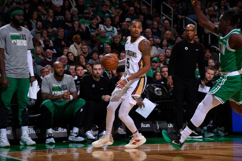 BOSTON, MA - JANUARY 12: Dejounte Murray #5 of the New Orleans Pelicans dribbles the ball during the game against the Boston Celtics on January 12, 2025 at TD Garden in Boston, Massachusetts. NOTE TO USER: User expressly acknowledges and agrees that, by downloading and/or using this Photograph, user is consenting to the terms and conditions of the Getty Images License Agreement. Mandatory Copyright Notice: Copyright 2025 NBAE (Photo by Brian Babineau/NBAE via Getty Images)