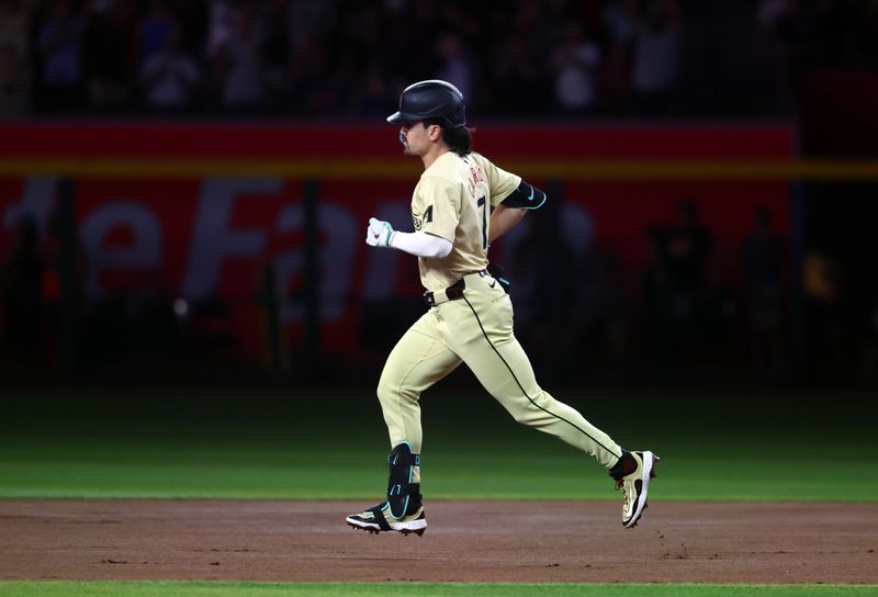 Aug 27, 2024; Phoenix, Arizona, USA; Arizona Diamondbacks outfielder Corbin Carroll rounds the bases after hitting a two run home run in the seventh inning against the New York Mets at Chase Field. Mandatory Credit: Mark J. Rebilas-USA TODAY Sports