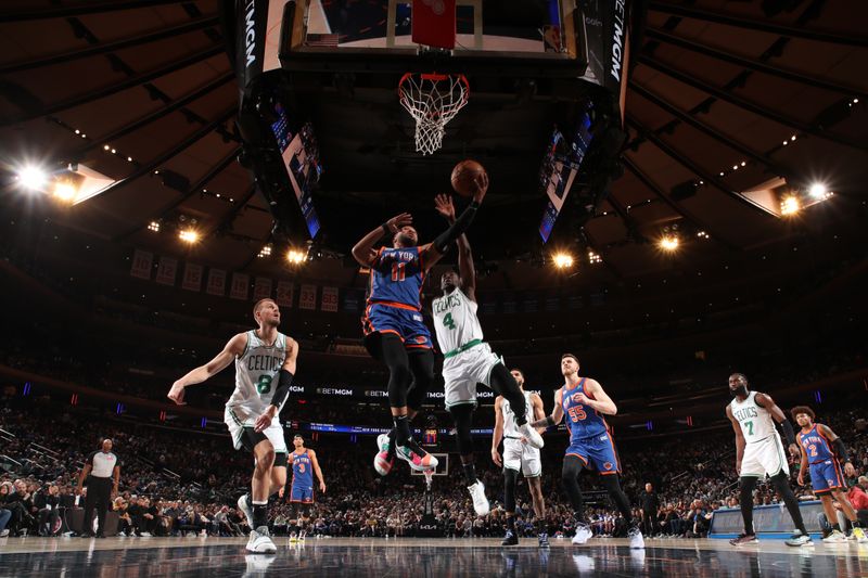 NEW YORK, NY - FEBRUARY 24: Jalen Brunson #11 of the New York Knicks drives to the basket during the game against the Boston Celtics on February 24, 2024 at Madison Square Garden in New York City, New York.  NOTE TO USER: User expressly acknowledges and agrees that, by downloading and or using this photograph, User is consenting to the terms and conditions of the Getty Images License Agreement. Mandatory Copyright Notice: Copyright 2024 NBAE  (Photo by Nathaniel S. Butler/NBAE via Getty Images)