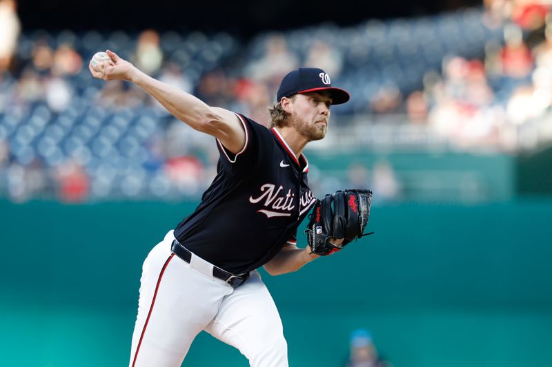 Apr 24, 2024; Washington, District of Columbia, USA; Washington Nationals pitcher Jake Irvin (27) pitches against the Los Angeles Dodgers during the first inning at Nationals Park. Mandatory Credit: Geoff Burke-USA TODAY Sports