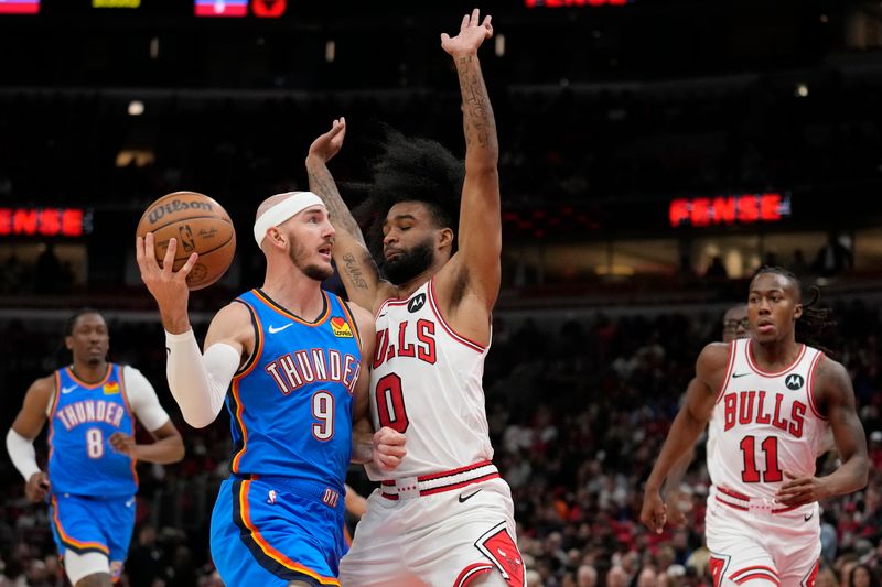 CHICAGO, ILLINOIS - OCTOBER 26: Alex Caruso #9 of the Oklahoma City Thunder goes to the basket against Coby White #0 of the Chicago Bulls at the United Center on October 26, 2024 in Chicago, Illinois. NOTE TO USER: User expressly acknowledges and agrees that, by downloading and or using this photograph, User is consenting to the terms and conditions of the Getty Images License Agreement. (Photo by Patrick McDermott/Getty Images)