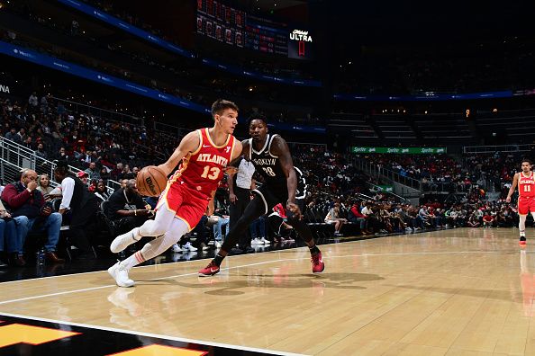 ATLANTA, GA - DECEMBER 6: Bogdan Bogdanovic #13 of the Atlanta Hawks drives to the basket during the game against the Brooklyn Nets on December 6, 2023 at State Farm Arena in Atlanta, Georgia.  NOTE TO USER: User expressly acknowledges and agrees that, by downloading and/or using this Photograph, user is consenting to the terms and conditions of the Getty Images License Agreement. Mandatory Copyright Notice: Copyright 2023 NBAE (Photo by Scott Cunningham/NBAE via Getty Images)