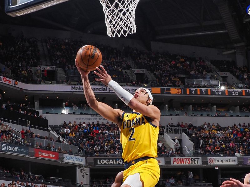 INDIANAPOLIS, IN - FEBUARY 3:  Andrew Nembhard #2 of the Indiana Pacers drives to the basket during the game on Febuary 3, 2023 at Gainbridge Fieldhouse in Indianapolis, Indiana. NOTE TO USER: User expressly acknowledges and agrees that, by downloading and or using this Photograph, user is consenting to the terms and conditions of the Getty Images License Agreement. Mandatory Copyright Notice: Copyright 2023 NBAE (Photo by Ron Hoskins/NBAE via Getty Images)