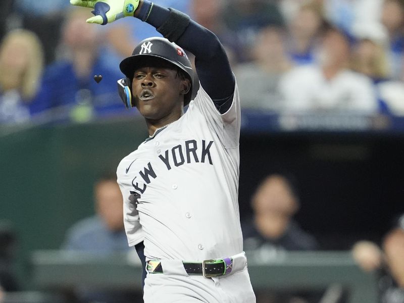 Oct 9, 2024; Kansas City, Missouri, USA; New York Yankees third base Jazz Chisholm Jr. (13) at bat in the fourth inning against the Kansas City Royals during game three of the NLDS for the 2024 MLB Playoffs at Kauffman Stadium. Mandatory Credit: Jay Biggerstaff -Imagn Images