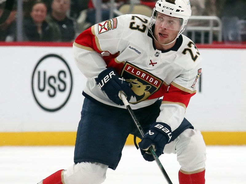 Dec 3, 2024; Pittsburgh, Pennsylvania, USA;  Florida Panthers center Carter Verhaeghe (23) skates up ice with the puck against the Pittsburgh Penguins during the third period at PPG Paints Arena. Mandatory Credit: Charles LeClaire-Imagn Images