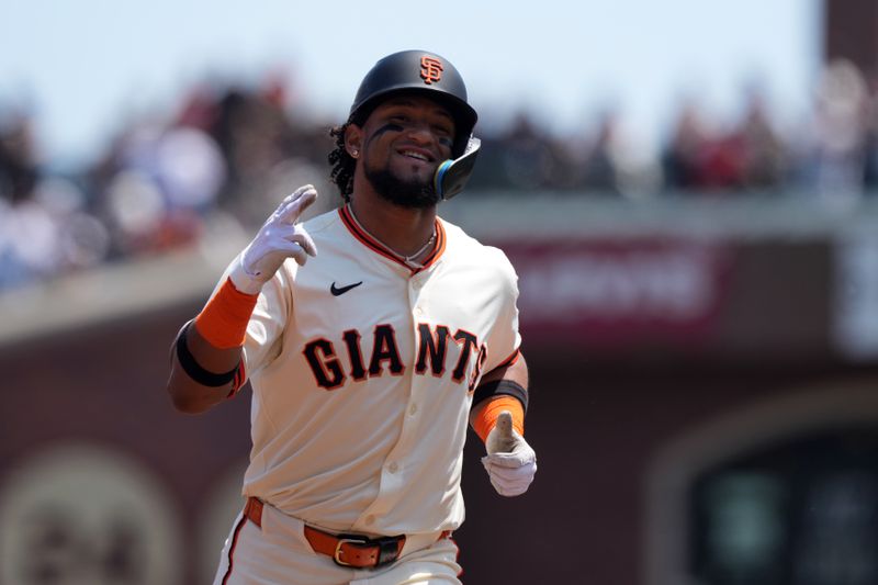 May 3, 2025; San Francisco, California, USA; San Francisco Giants designated hitter Luis Matos (29) gestures while rounding the bases after hitting a home run against the Colorado Rockies during the third inning at Oracle Park. Mandatory Credit: Darren Yamashita-Imagn Images