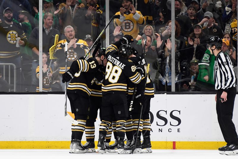 Mar 16, 2024; Boston, Massachusetts, USA; Boston Bruins center Charlie Coyle (13) celebrates his goal with his teammates during the second period against the Philadelphia Flyers at TD Garden. Mandatory Credit: Bob DeChiara-USA TODAY Sports