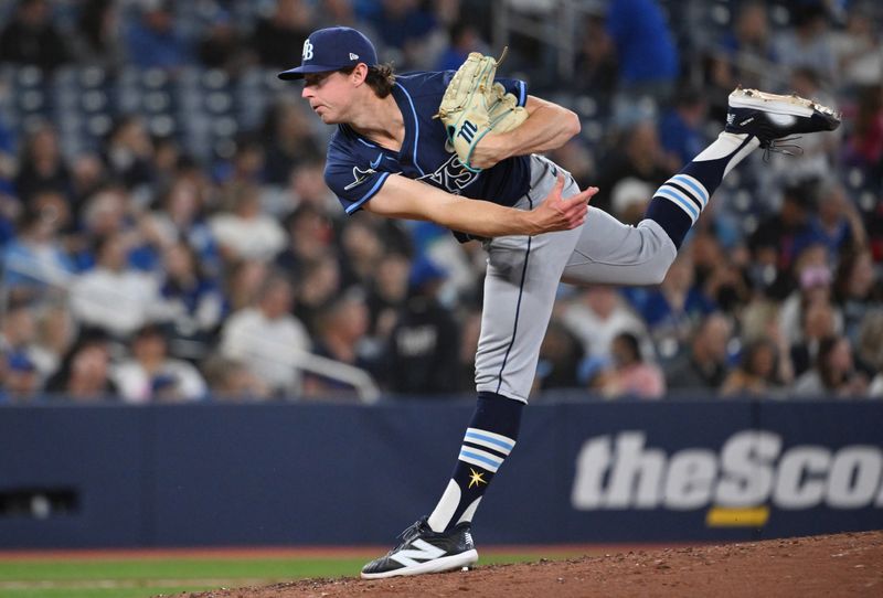 May 14, 2025; Toronto, Ontario, CAN;  Tampa Bay Rays starting pitcher Ryan Pepiot (44) delivers a pitch against the Toronto Blue Jays in the third inning at Rogers Centre. Mandatory Credit: Dan Hamilton-Imagn Images