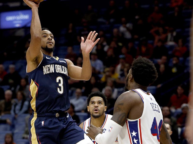 NEW ORLEANS, LOUISIANA - NOVEMBER 29: CJ McCollum #3 of the New Orleans Pelicans shoots over Paul Reed #44 of the Philadelphia 76ers during the third quarter of an NBA game at Smoothie King Center on November 29, 2023 in New Orleans, Louisiana. NOTE TO USER: User expressly acknowledges and agrees that, by downloading and or using this photograph, User is consenting to the terms and conditions of the Getty Images License Agreement. (Photo by Sean Gardner/Getty Images)