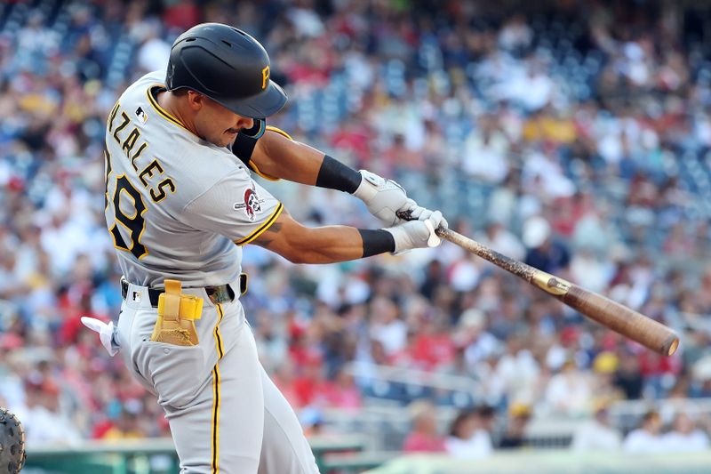Sep 13, 2025; Washington, District of Columbia, USA; Pittsburgh Pirates infielder Nick Gonzales (39) hits a single during the first inning against the Washington Nationals at Nationals Park. Mandatory Credit: Daniel Kucin Jr.-Imagn Images