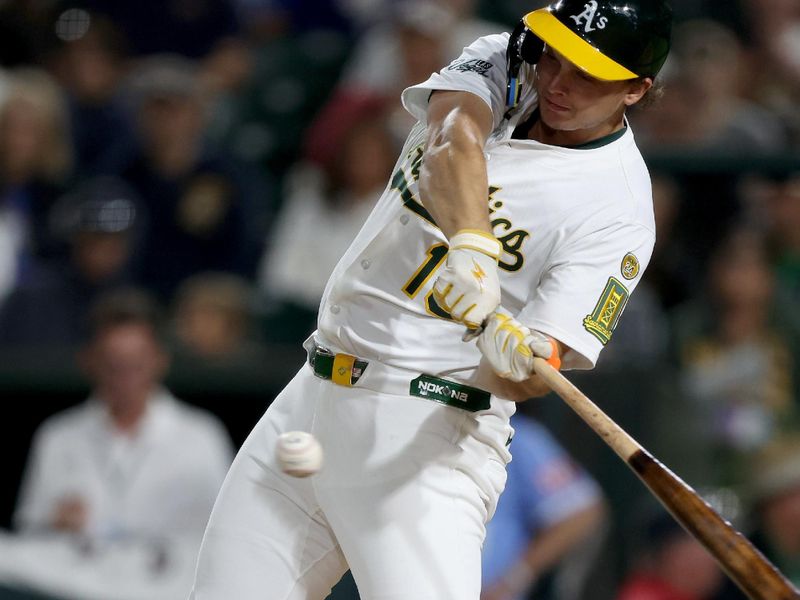 Sep 27, 2025; West Sacramento, California, USA; Athletics first baseman Nick Kurtz (16) hits a single against the Kansas City Royals during the eighth inning at Sutter Health Park. Mandatory Credit: Dennis Lee-Imagn Images