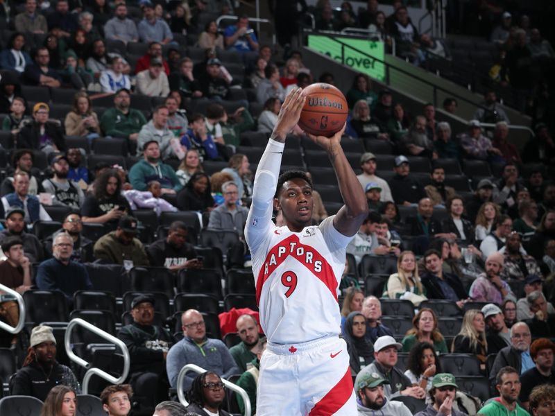 MILWAUKEE, WI - NOVEMBER 12:   RJ Barrett #9 of the Toronto Raptors shoots a three point basket during the game against the Milwaukee Bucks during the Emirates NBA Cup game on November 12, 2024 at Fiserv Forum Center in Milwaukee, Wisconsin. NOTE TO USER: User expressly acknowledges and agrees that, by downloading and or using this Photograph, user is consenting to the terms and conditions of the Getty Images License Agreement. Mandatory Copyright Notice: Copyright 2024 NBAE (Photo by Gary Dineen/NBAE via Getty Images).