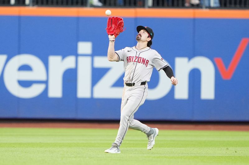 May 31, 2024; New York City, New York, USA; Arizona Diamondbacks center fielder Corbin Carroll (7) catches a fly ball hit by New York Mets first baseman Pete Alonso (not pictured) during the first inning at Citi Field. Mandatory Credit: Gregory Fisher-USA TODAY Sports