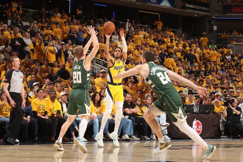 INDIANAPOLIS, IN - APRIL 26: Tyrese Haliburton #0 of the Indiana Pacers shoots the ball during the game against the Milwaukee Bucks during Round 1 Game 3 of the 2024 NBA Playoffs on April 26, 2024 at Gainbridge Fieldhouse in Indianapolis, Indiana. NOTE TO USER: User expressly acknowledges and agrees that, by downloading and or using this Photograph, user is consenting to the terms and conditions of the Getty Images License Agreement. Mandatory Copyright Notice: Copyright 2023 NBAE (Photo by Nathaniel S. Butler/NBAE via Getty Images)