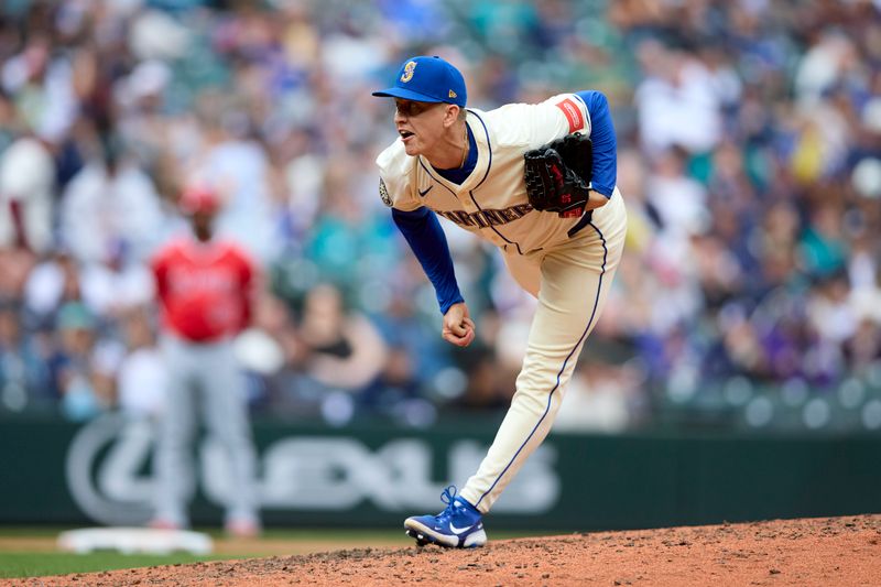 Sep 14, 2025; Seattle, Washington, USA; Seattle Mariners pitcher Casey Legumina (64) throws against the Los Angeles Angels during the ninth inning at T-Mobile Park. Mandatory Credit: John Froschauer-Imagn Images