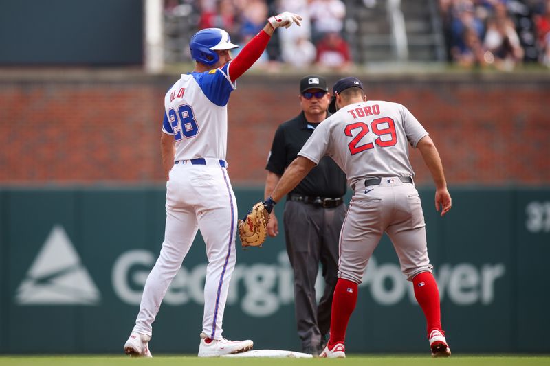 May 31, 2025; Atlanta, Georgia, USA; Atlanta Braves first baseman Matt Olson (28) reacts after an RBI double against the Boston Red Sox in the first inning at Truist Park. Mandatory Credit: Brett Davis-Imagn Images