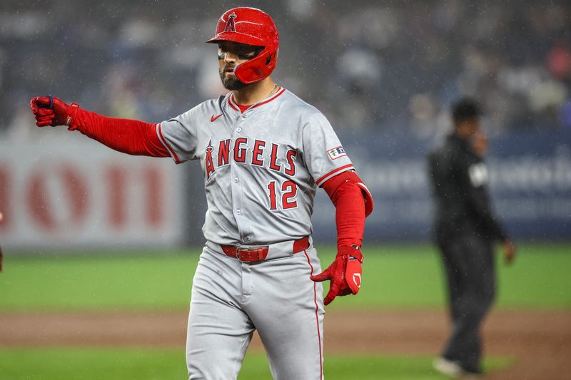 Aug 8, 2024; Bronx, New York, USA;  Los Angeles Angels left fielder Kevin Pillar (12) gestures after hitting a two run single in the fifth inning against the New York Yankees at Yankee Stadium. Mandatory Credit: Wendell Cruz-USA TODAY Sports