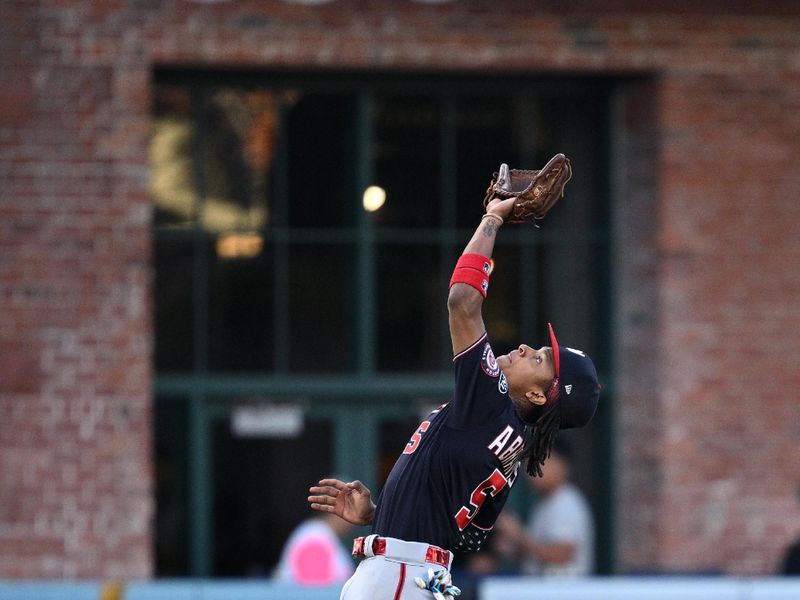 Jun 24, 2023; San Diego, California, USA; Washington Nationals shortstop C.J. Abrams (5) catchers a pop-up hit by San Diego Padres first baseman Jake Cronenworth (not pictured) during the sixth inning at Petco Park. Mandatory Credit: Orlando Ramirez-USA TODAY Sports