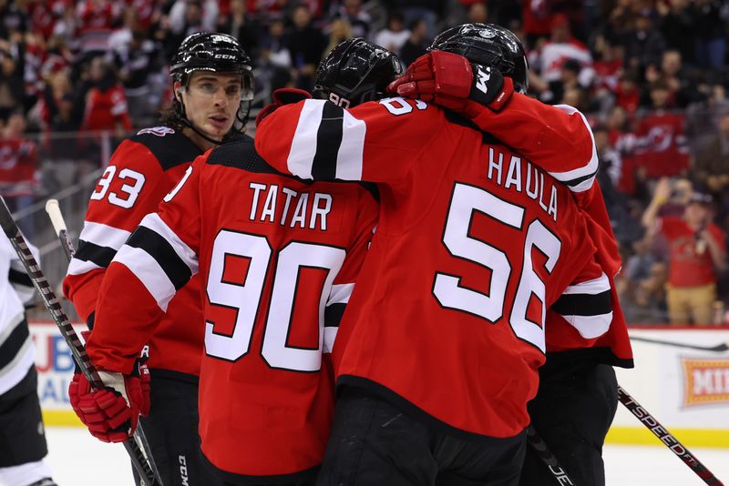 Feb 23, 2023; Newark, New Jersey, USA; New Jersey Devils left wing Tomas Tatar (90) celebrates his goal against the Los Angeles Kings during the second period at Prudential Center. Mandatory Credit: Ed Mulholland-USA TODAY Sports