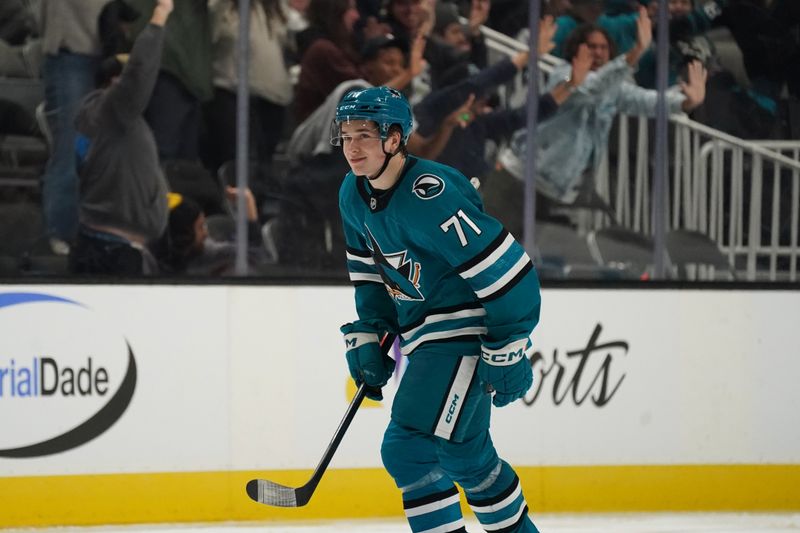 Nov 25, 2024; San Jose, California, USA; San Jose Sharks center Macklin Celebrini (71) celebrates after scoring a goal against the Los Angeles Kings in the third period at SAP Center at San Jose. Mandatory Credit: David Gonzales-Imagn Images