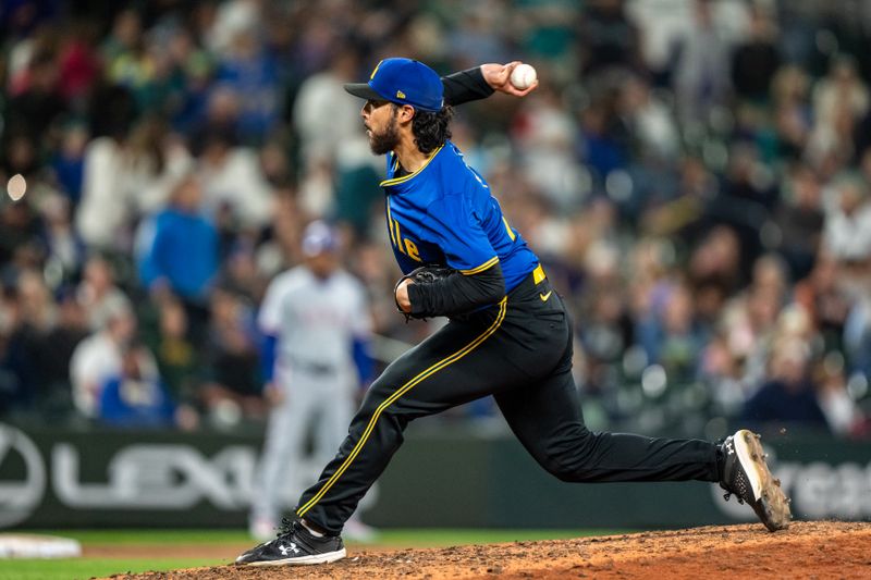 Sep 13, 2024; Seattle, Washington, USA;  Seattle Mariners reliever Andres Munoz (75) delivers a pitch during the ninth inning against the Texas Rangers at T-Mobile Park. Mandatory Credit: Stephen Brashear-Imagn Images