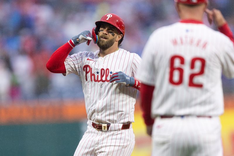 May 15, 2024; Philadelphia, Pennsylvania, USA; Philadelphia Phillies first base Bryce Harper (3) reacts after hitting a home run during the first inning against the New York Mets at Citizens Bank Park. Mandatory Credit: Bill Streicher-USA TODAY Sports