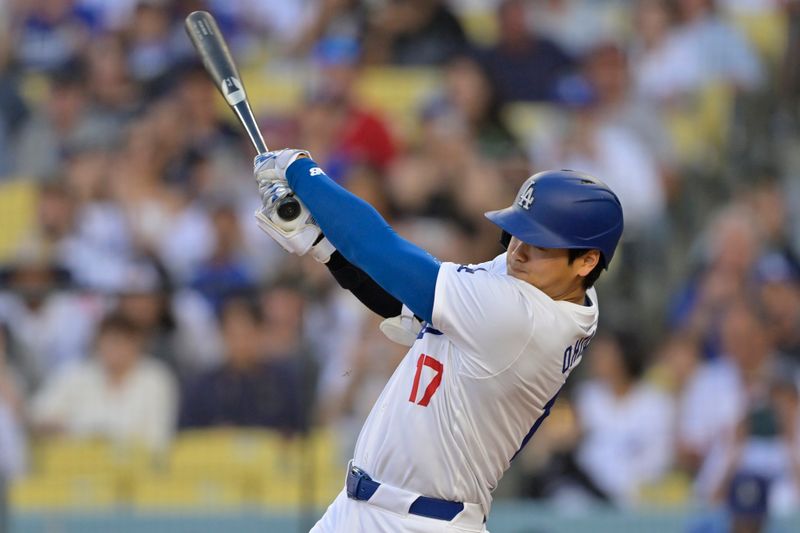 Jun 21, 2024; Los Angeles, California, USA;  Los Angeles Dodgers designated hitter Shohei Ohtani (17) at bat in the first inning against the Los Angeles Angels at Dodger Stadium. Mandatory Credit: Jayne Kamin-Oncea-USA TODAY Sports