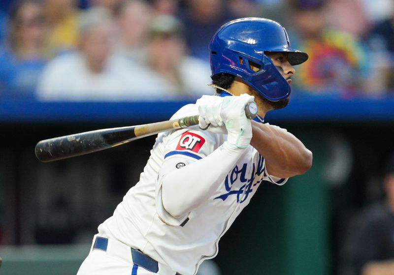 May 20, 2024; Kansas City, Missouri, USA; Kansas City Royals left fielder MJ Melendez (1) hits a single during the sixth inning against the Detroit Tigers at Kauffman Stadium. Mandatory Credit: Jay Biggerstaff-USA TODAY Sports