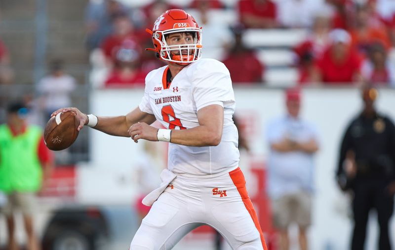 Sep 23, 2023; Houston, Texas, USA; Sam Houston State Bearkats quarterback Grant Gunnell (8) attempts a pass during the first quarter against the Houston Cougars at TDECU Stadium. Mandatory Credit: Troy Taormina-USA TODAY Sports