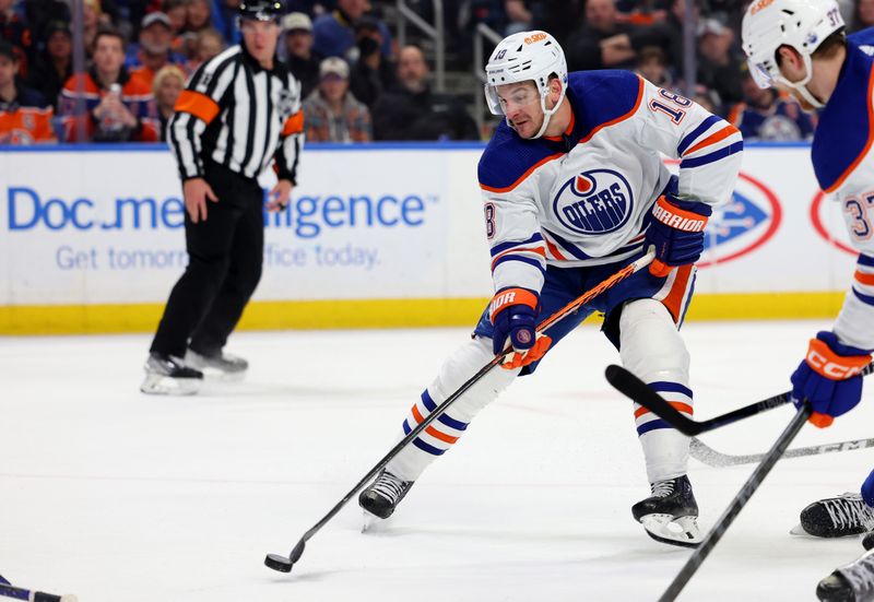 Mar 6, 2023; Buffalo, New York, USA;  Edmonton Oilers left wing Zach Hyman (18) takes a shot on goal during the third period against the Edmonton Oilers at KeyBank Center. Mandatory Credit: Timothy T. Ludwig-USA TODAY Sports