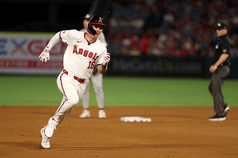 Jul 25, 2024; Anaheim, California, USA;  Los Angeles Angels center fielder Mickey Moniak (16) runs to third base on a double during the seventh inning against the Oakland Athletics at Angel Stadium. Mandatory Credit: Kiyoshi Mio-USA TODAY Sports