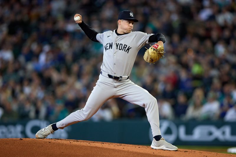 May 14, 2025; Seattle, Washington, USA; New York Yankees pitcher Will Warren (98) throws against the Seattle Mariners during the first inning at T-Mobile Park. Mandatory Credit: John Froschauer-Imagn Images