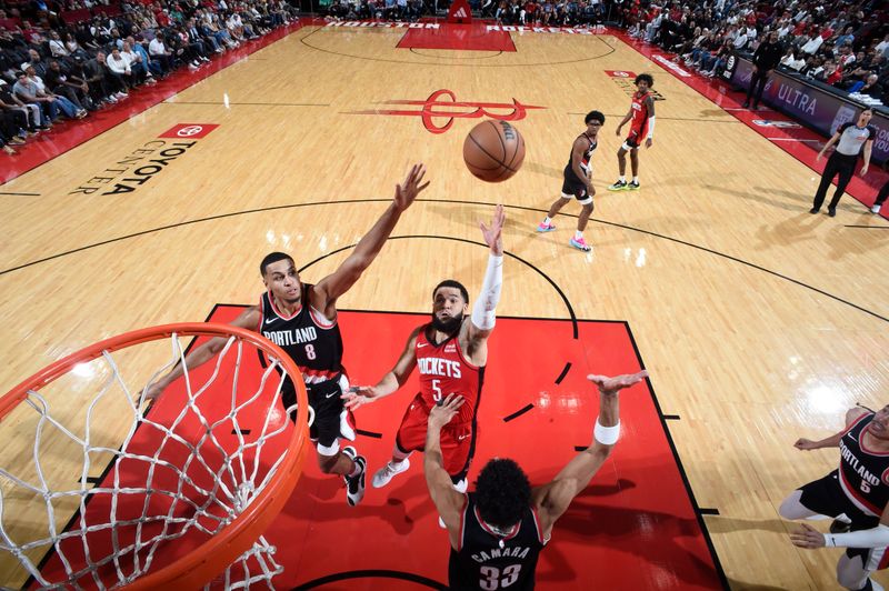 HOUSTON, TX - MARCH 25: Fred VanVleet #5 of the Houston Rockets drives to the basket during the game against the Portland Trail Blazers on March 25, 2024 at the Toyota Center in Houston, Texas. NOTE TO USER: User expressly acknowledges and agrees that, by downloading and or using this photograph, User is consenting to the terms and conditions of the Getty Images License Agreement. Mandatory Copyright Notice: Copyright 2024 NBAE (Photo by Logan Riely/NBAE via Getty Images)