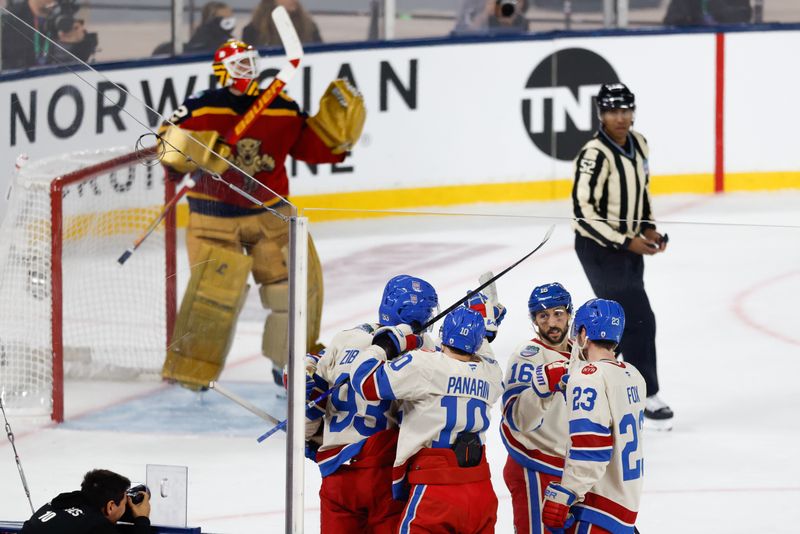 Jan 2, 2026; Miami, Florida, USA; New York Rangers center Mika Zibanejad (93) celebrates with teammates after scoring a goal against the Florida Panthers during the first period in the 2026 Winter Classic ice hockey game at loanDepot Park. Mandatory Credit: Rhona Wise-Imagn Images
