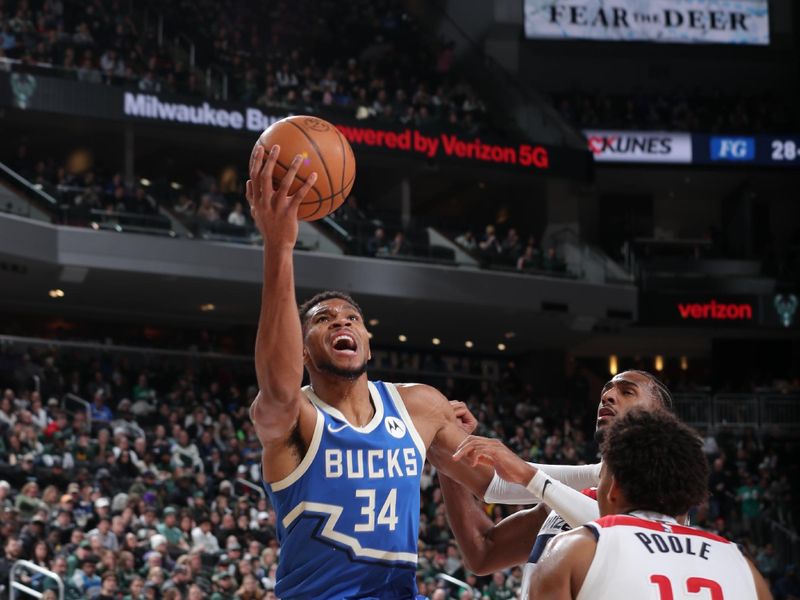 MILWAUKEE, WI - NOVEMBER 30: Giannis Antetokounmpo #34 of the Milwaukee Bucks drives to the basket during the game against the Washington Wizards on November 30, 2024 at Fiserv Forum Center in Milwaukee, Wisconsin. NOTE TO USER: User expressly acknowledges and agrees that, by downloading and or using this Photograph, user is consenting to the terms and conditions of the Getty Images License Agreement. Mandatory Copyright Notice: Copyright 2024 NBAE (Photo by Gary Dineen/NBAE via Getty Images).