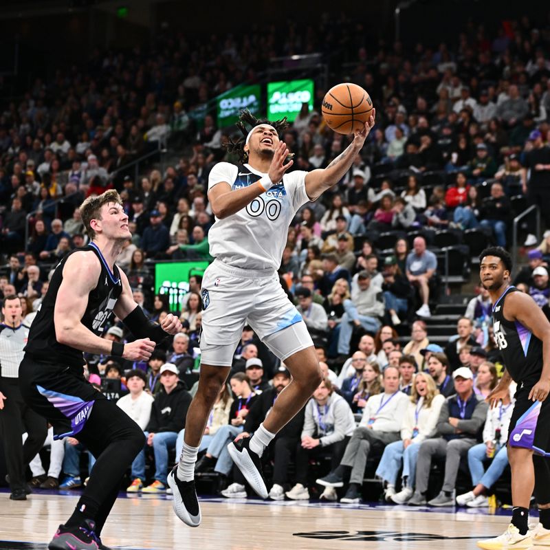 SALT LAKE CITY, UT - FEBRUARY 28:  Terrence Shannon Jr. #00 of the Minnesota Timberwolves drives to the basket during the game against the Utah Jazz  on February 28, 2025 at Delta Center in Salt Lake City, Utah. NOTE TO USER: User expressly acknowledges and agrees that, by downloading and or using this Photograph, User is consenting to the terms and conditions of the Getty Images License Agreement. Mandatory Copyright Notice: Copyright 2025 NBAE (Photo by Jamie Sabau/NBAE via Getty Images)