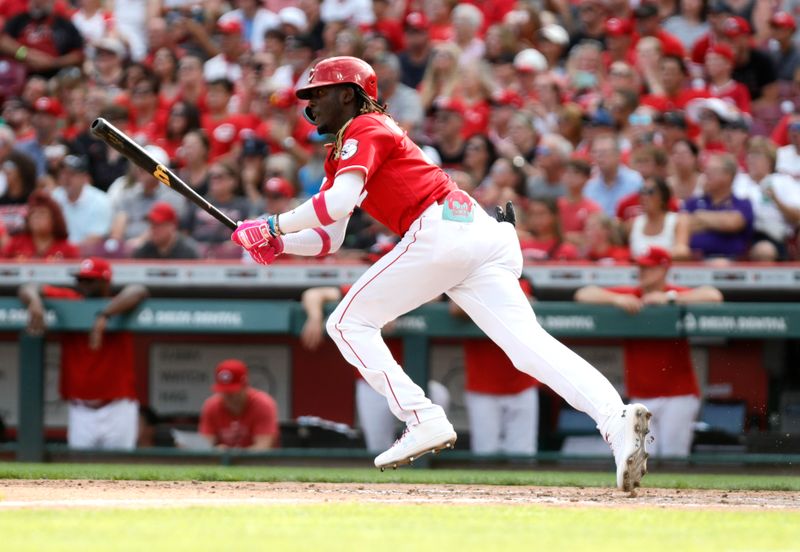 Aug 5, 2023; Cincinnati, Ohio, USA; Cincinnati Reds third baseman Elly De La Cruz (44) hits a single against the Washington Nationals during the sixth inning at Great American Ball Park. Mandatory Credit: David Kohl-USA TODAY Sports