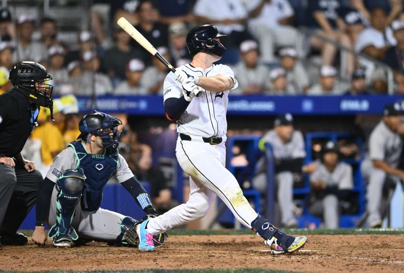 Aug 18, 2024; Williamsport, Pennsylvania, USA; Detroit Tigers infielder Colt Keith (33) hits a double against the New York Yankees in the ninth inning at BB&T Ballpark at Historic Bowman Field. Mandatory Credit: Kyle Ross-USA TODAY Sports